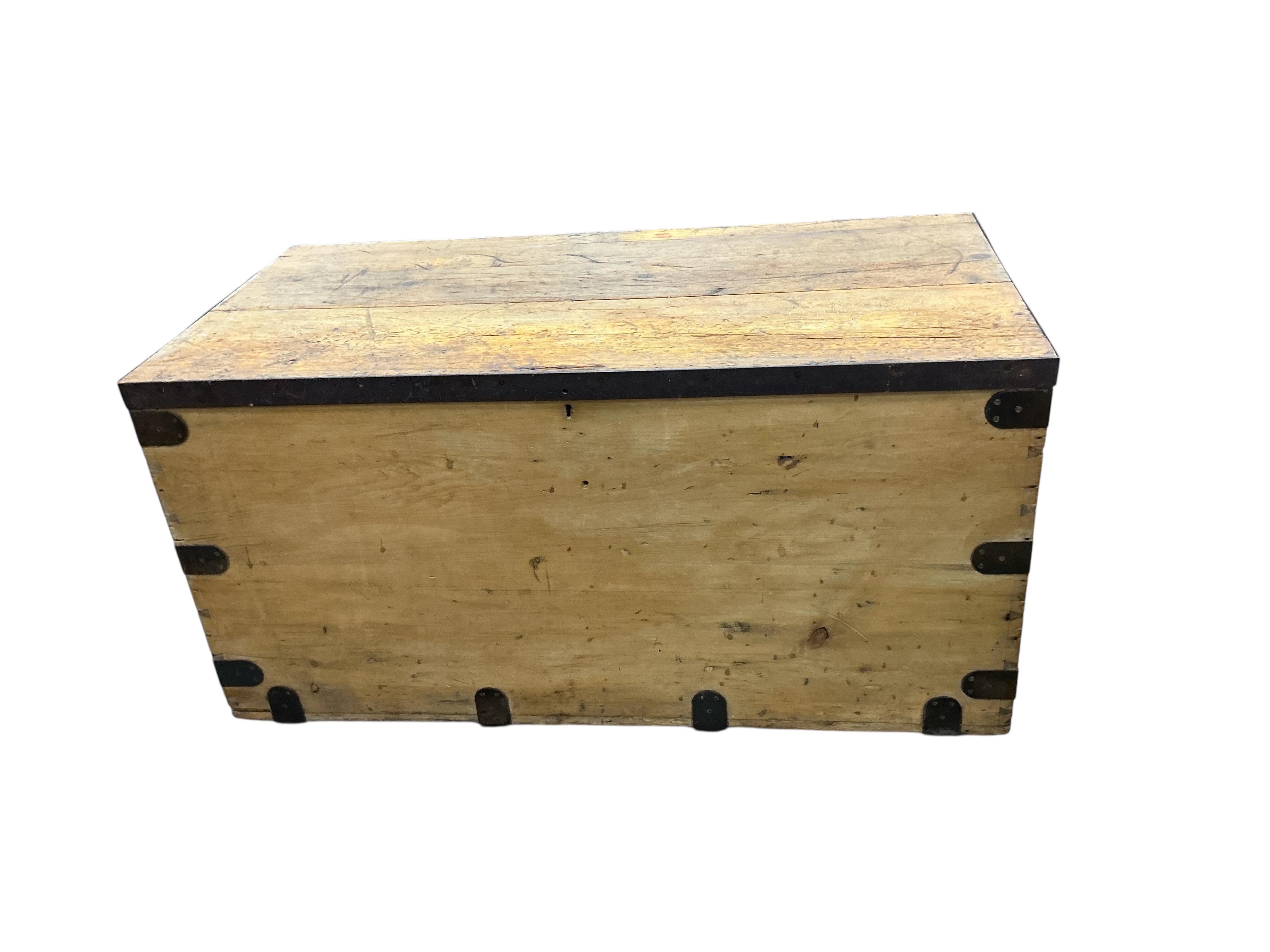 A large iron bound pine trunk, width 120cn, depth 61cm, height 61cm